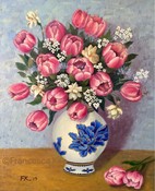 Tulips and blue flower vase